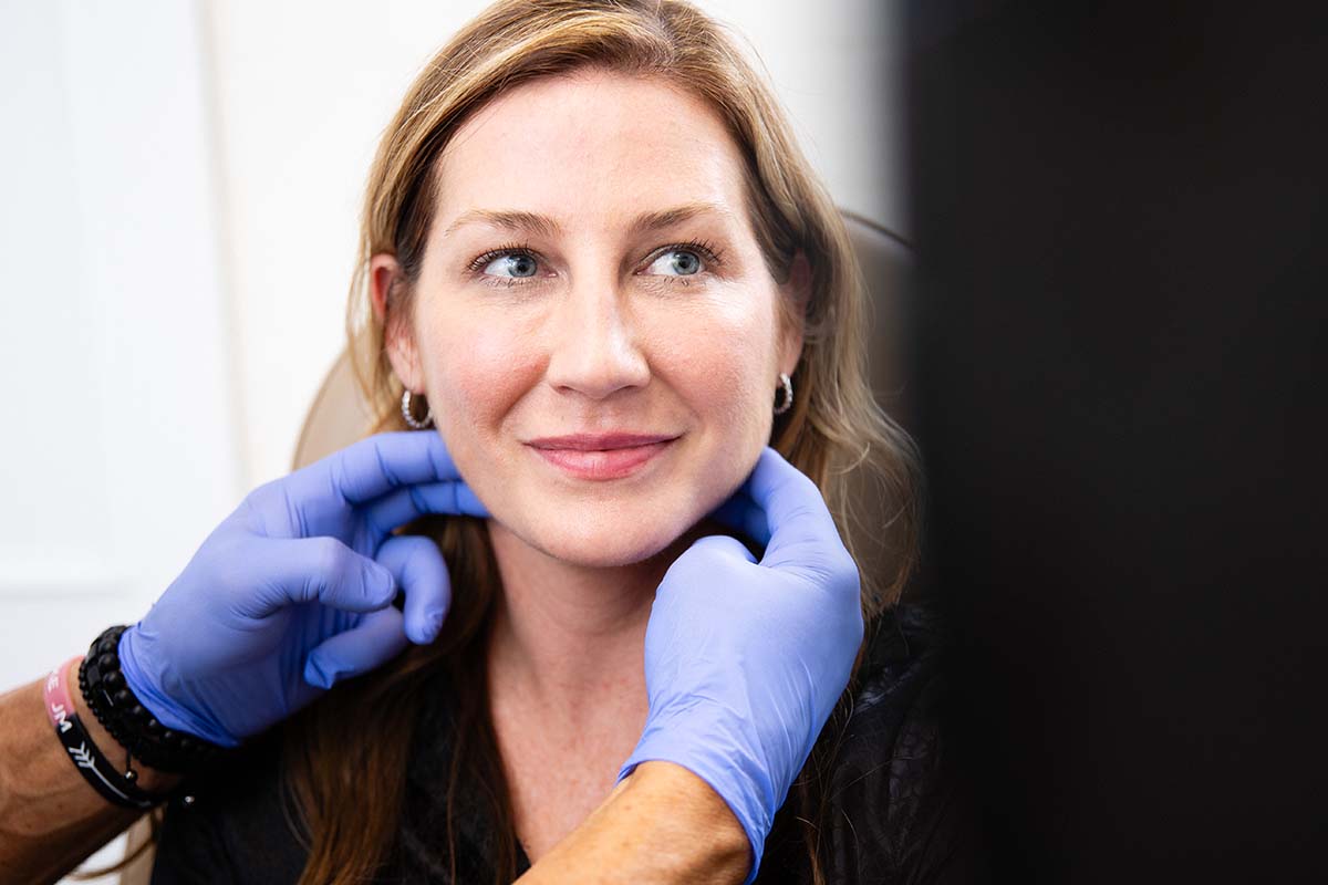 Woman getting consult for chin augmentation in Daytona Beach